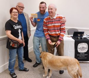 Left to right: Gill Smith and Gerry Walsh, present prizes to the joint winners of the Challengers, Bittor Ibanez and John Fullwood (with Monty)