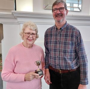 Steve Burnell received the Peter Gibbs Memorial Trophy from Celia Gibbs