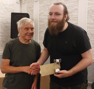 Brandan Read (R) receives BCA British Championship trophy from Chairman Voldi Gailans.