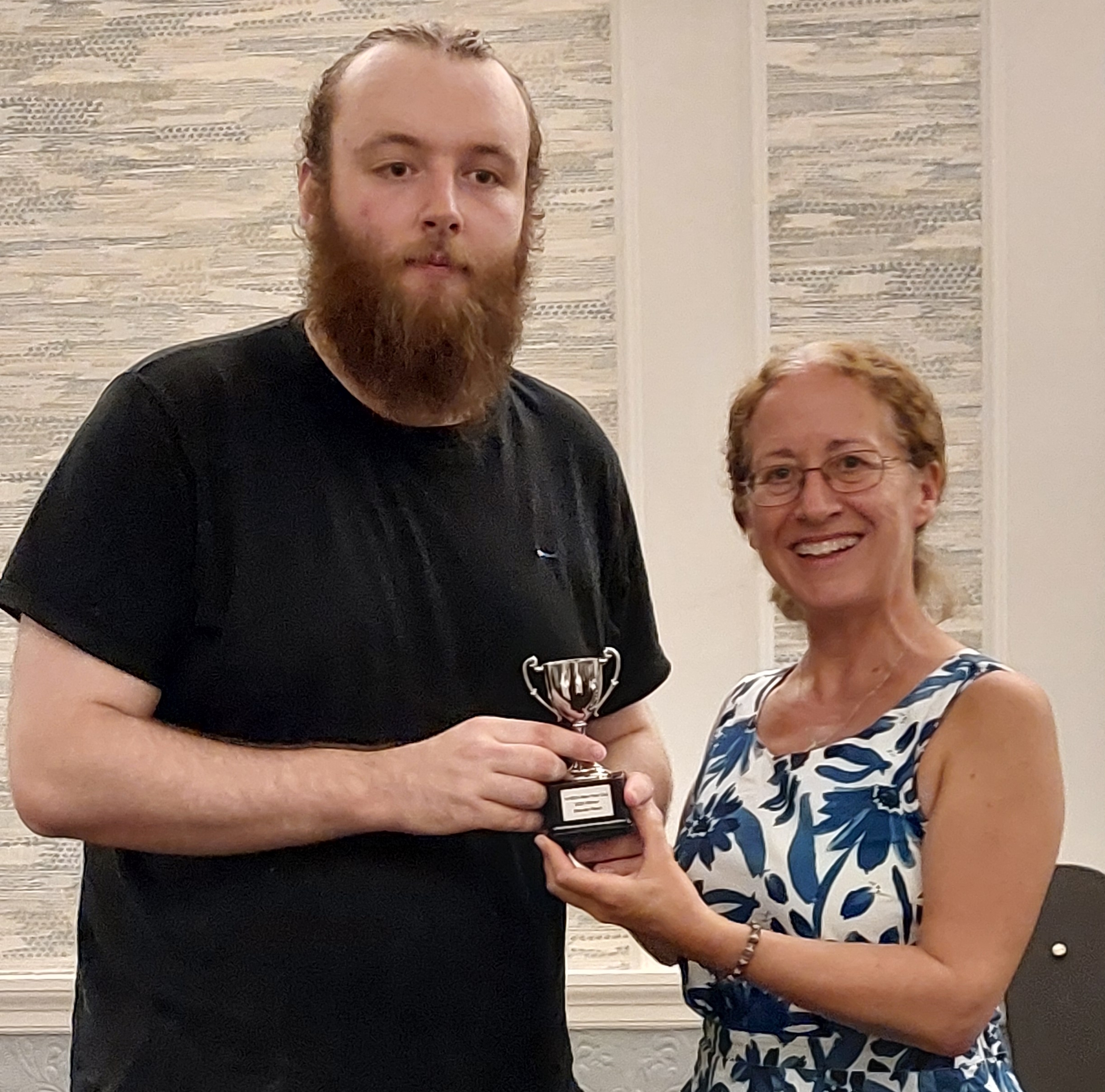 Brandan Read receives the Inaugural New Year Cup Open Trophy
