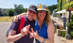 Des Masterson and Helen Humle smiling outside the hotel
